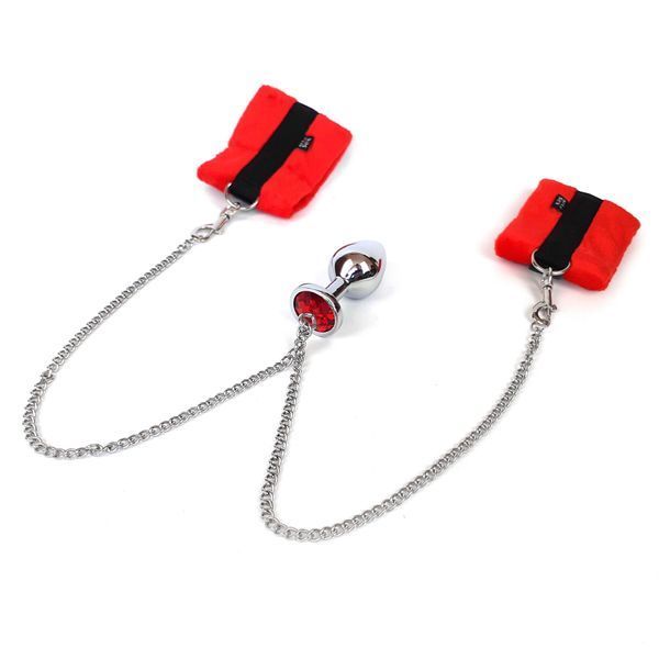 Наручники з червоною металевою анальною пробкою, розмір М - Art of Sex Handcuffs with Metal Anal Plug SO6182 фото